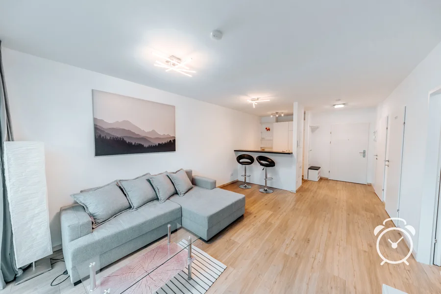 Wohnzimmer - KURZZEiTmiete - 2 Zimmer Wohnung Elsbethen - Salzburg | © OCNSMEDIA OG