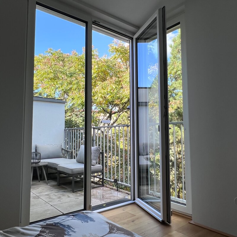 Bright bedroom with balcony access – 2-room apartment, short-term rental & temporary housing for 1 to 6 months, Vienna