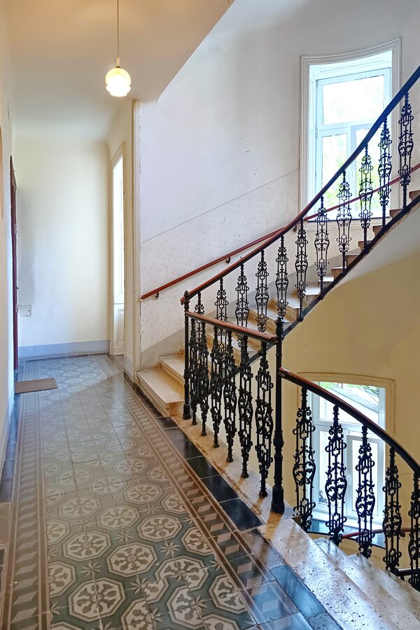 view from apartment on classical stair case