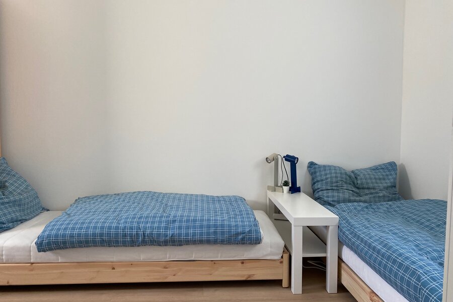 Schlafzimmer mit 2 Einzelbetten
