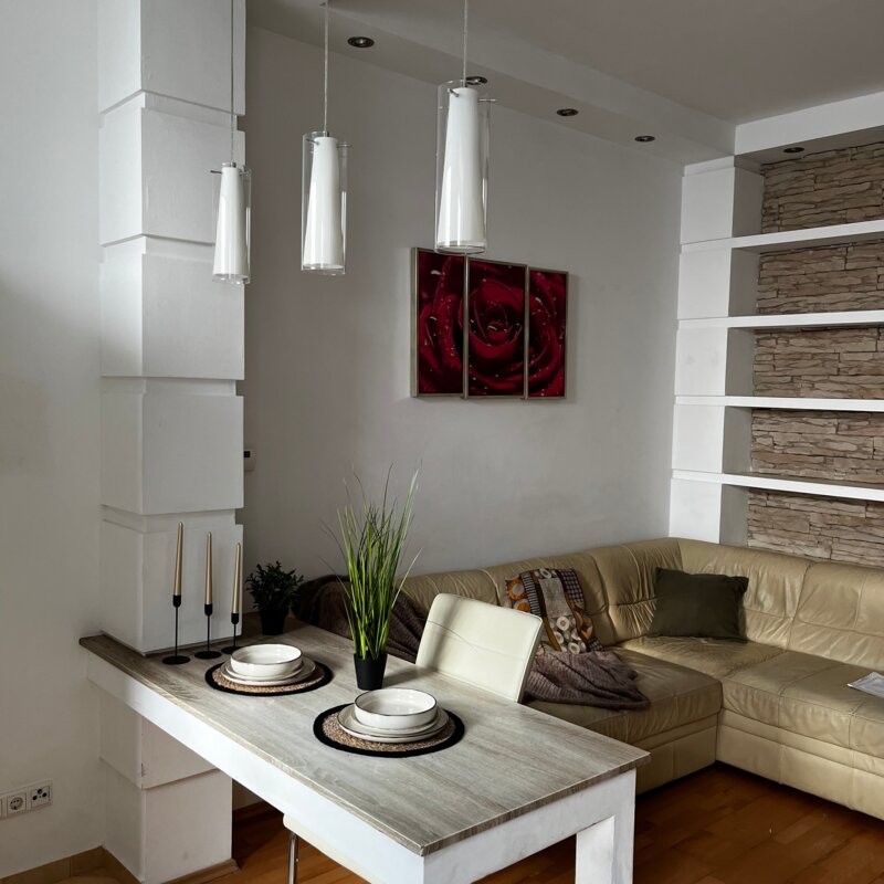 Stylish living and dining area with designer furniture – 2-room apartment, short-term rental, temporary housing 1 to 6 months, Vienna