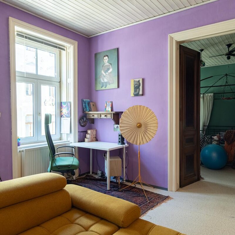 livingroom with view into bedroom