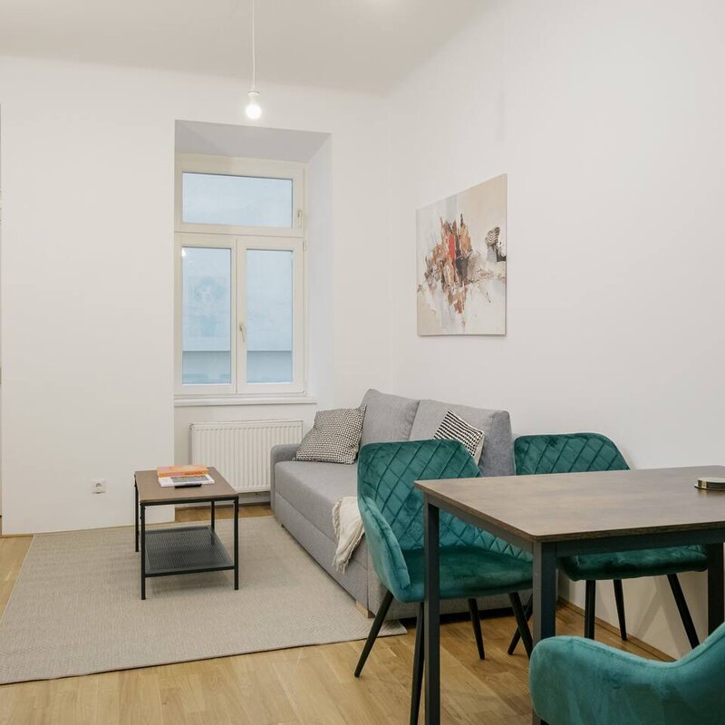 Bright living area with modern furniture – 2-room apartment, short-term rental, temporary housing for 1 to 6 months, Vienna | © Apartment Care GmbH