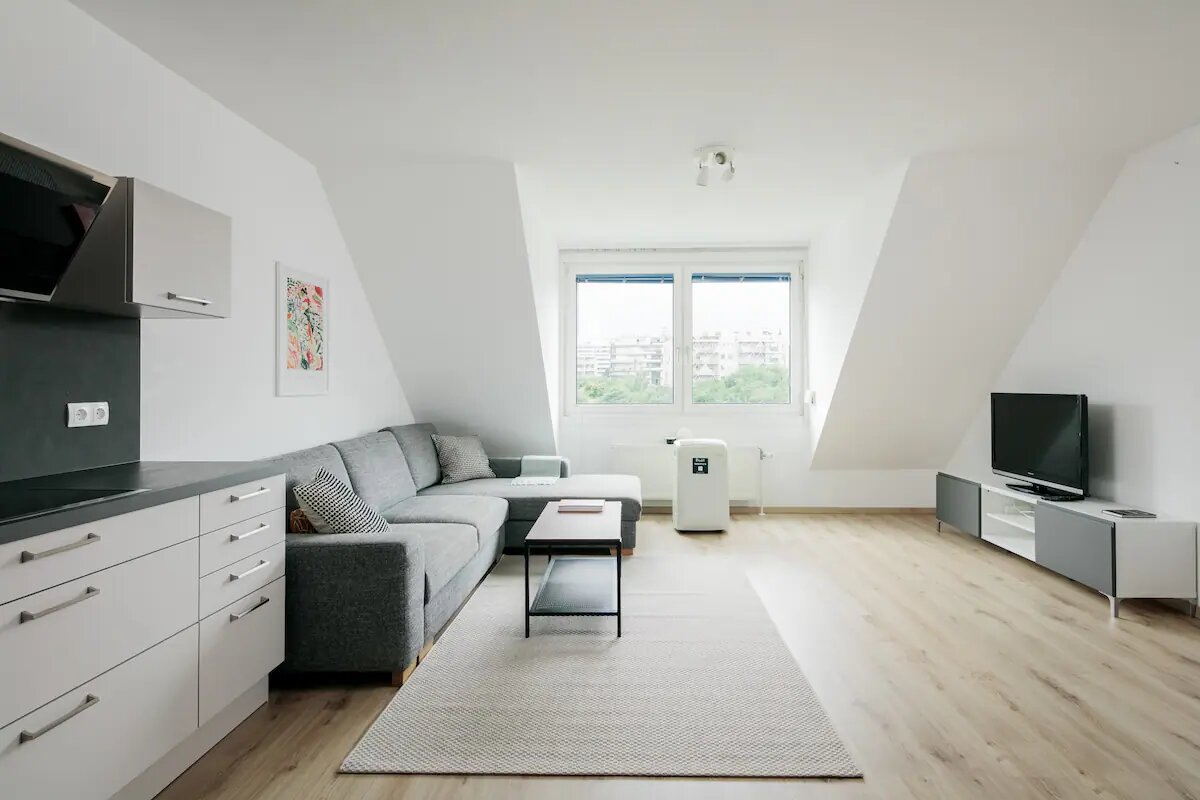 Bright living area with kitchen – 3-room apartment for short-term rental & temporary housing for 1 to 6 months in Vienna
