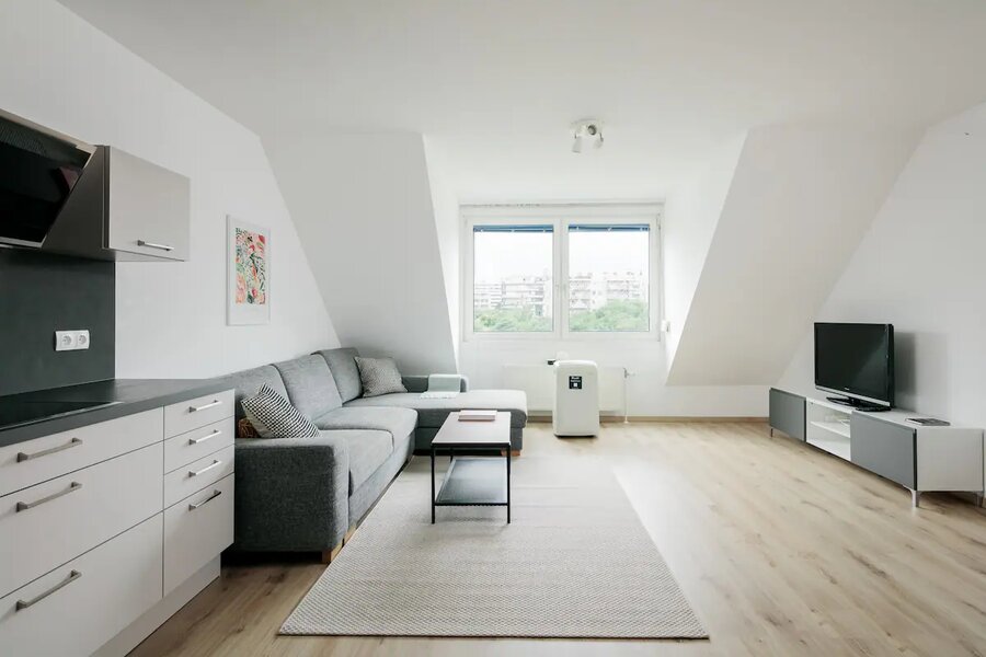 Bright living area with kitchen – 3-room apartment for short-term rental & temporary housing for 1 to 6 months in Vienna