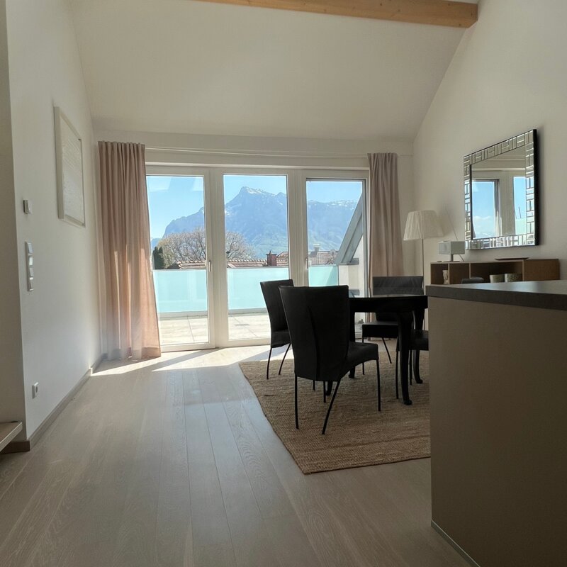 Bright living room with mountain panorama – 2-room apartment for short-term rental & temporary housing for 1 to 6 months in Salzburg