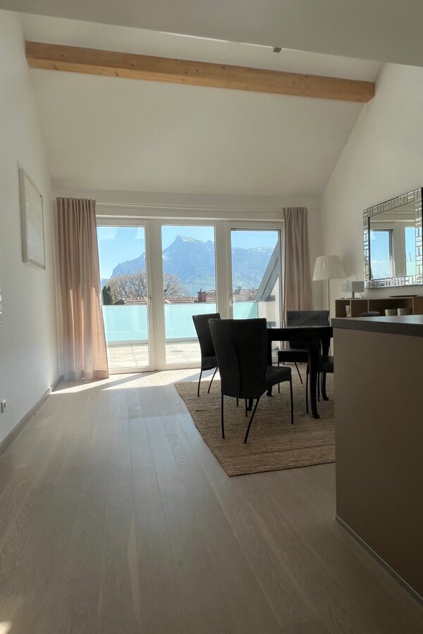 Bright living room with mountain panorama – 2-room apartment for short-term rental & temporary housing for 1 to 6 months in Salzburg