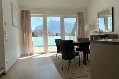 Bright living room with mountain panorama – 2-room apartment for short-term rental & temporary housing for 1 to 6 months in Salzburg