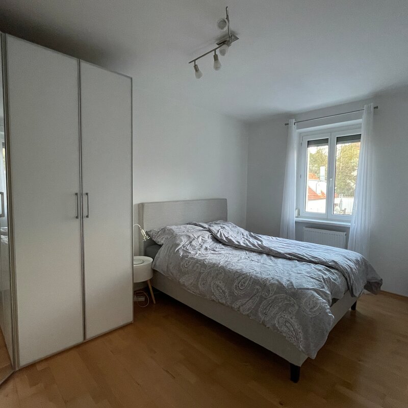 Bed and large corner wardrobe