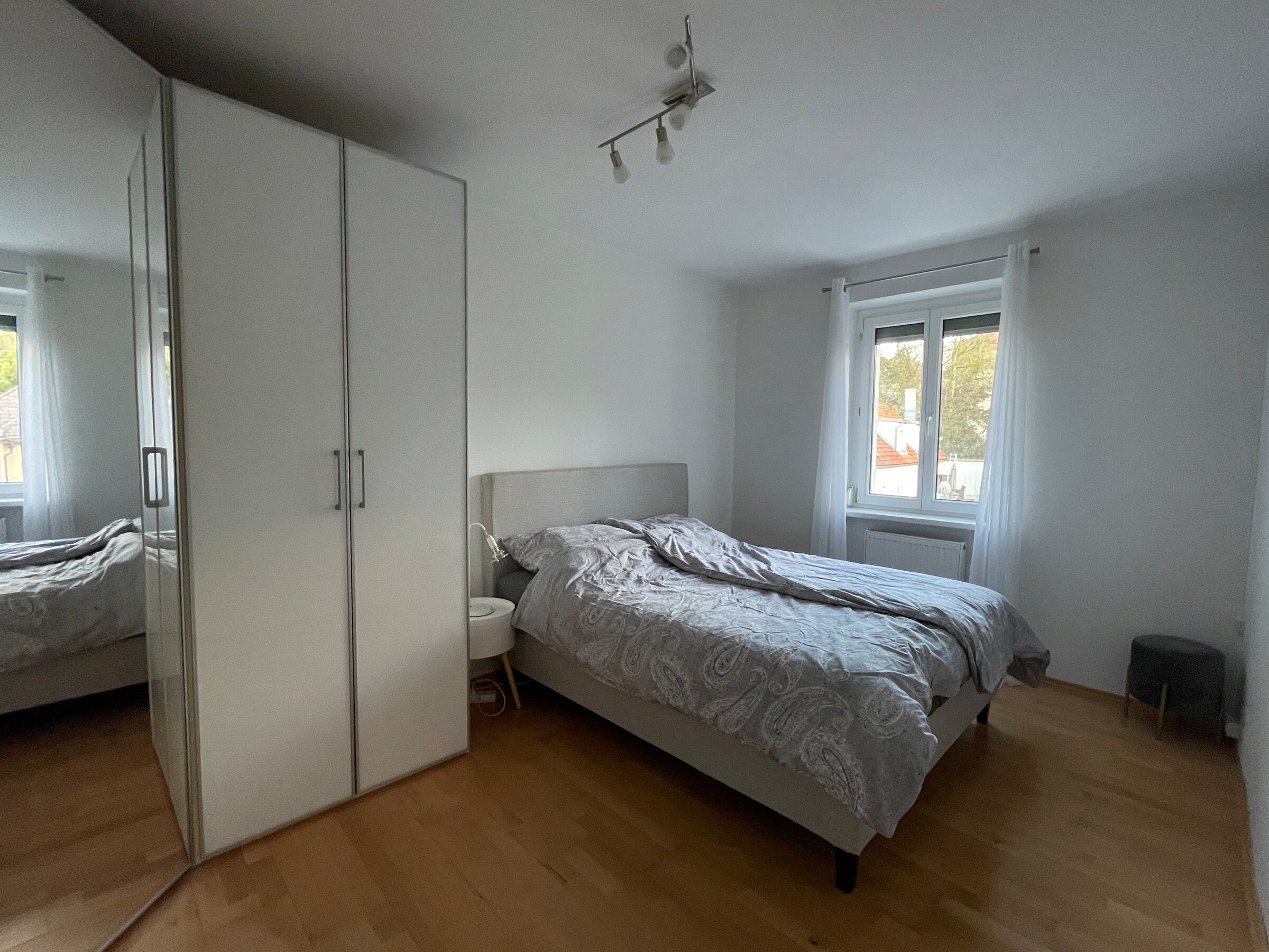 Bed and large corner wardrobe