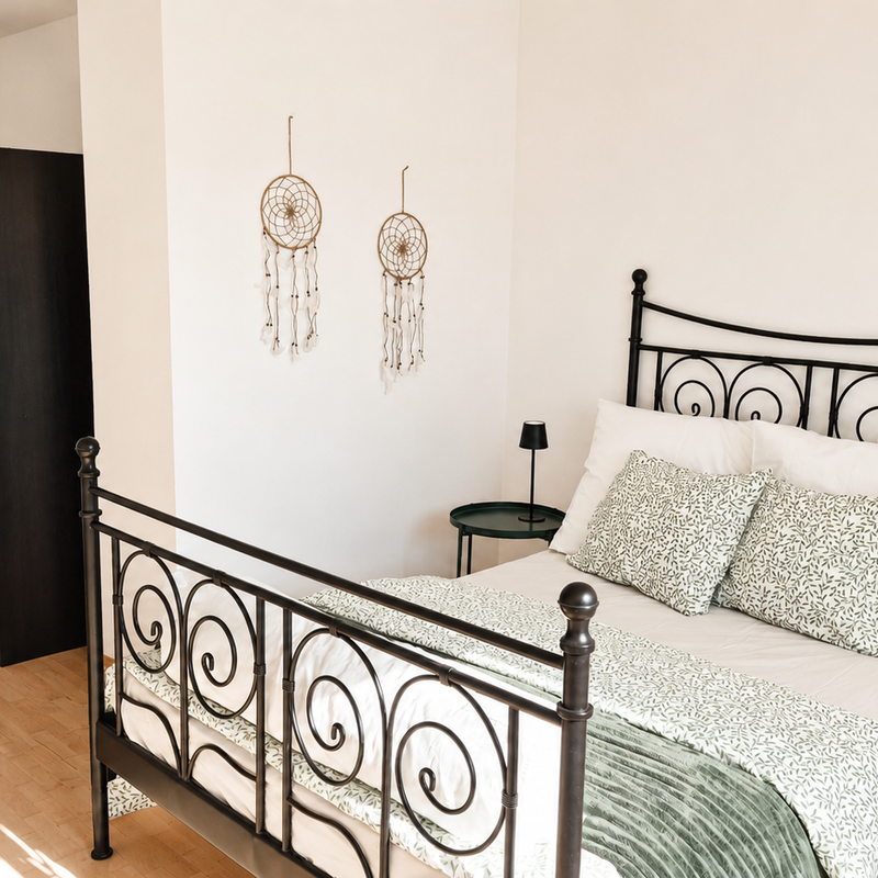 Bright bedroom with ample storage space | © privat