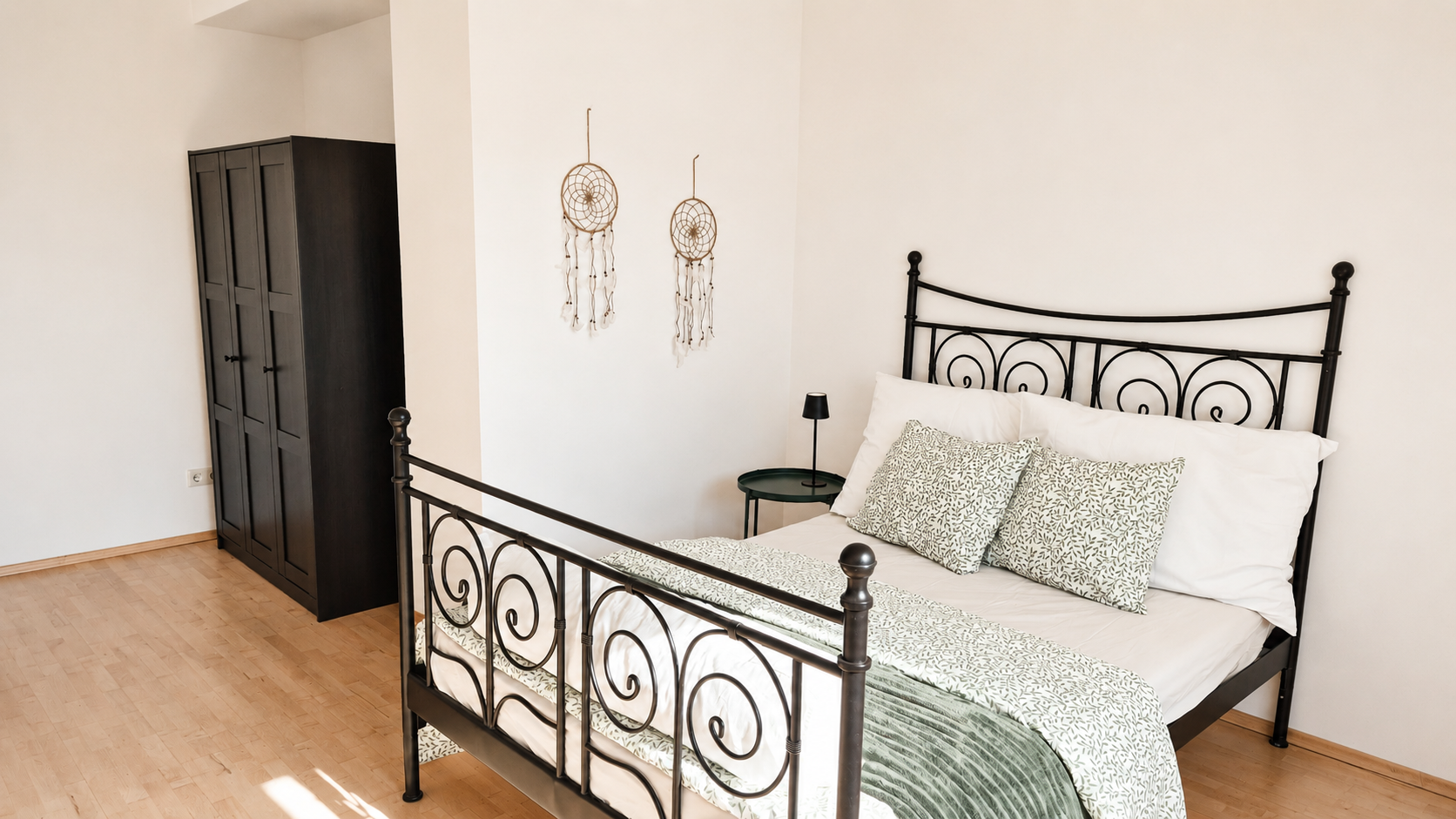 Bright bedroom with ample storage space | © privat