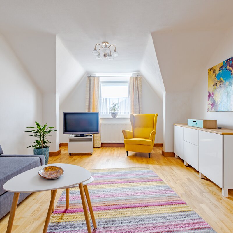 Bright, cozily furnished living room