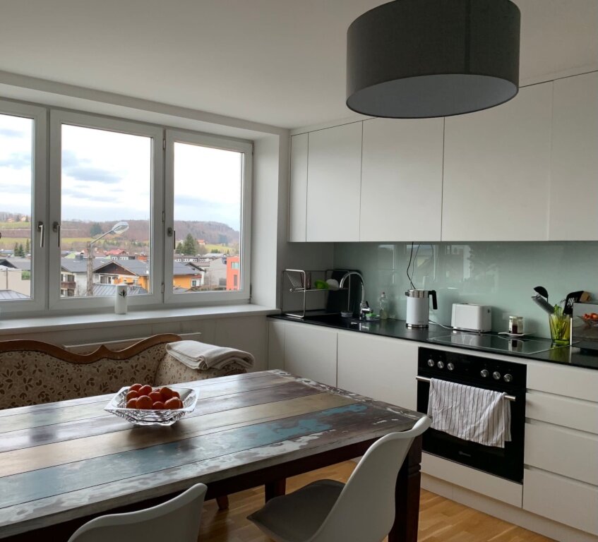 Spacious open-plan kitchen and living area as a shared common space