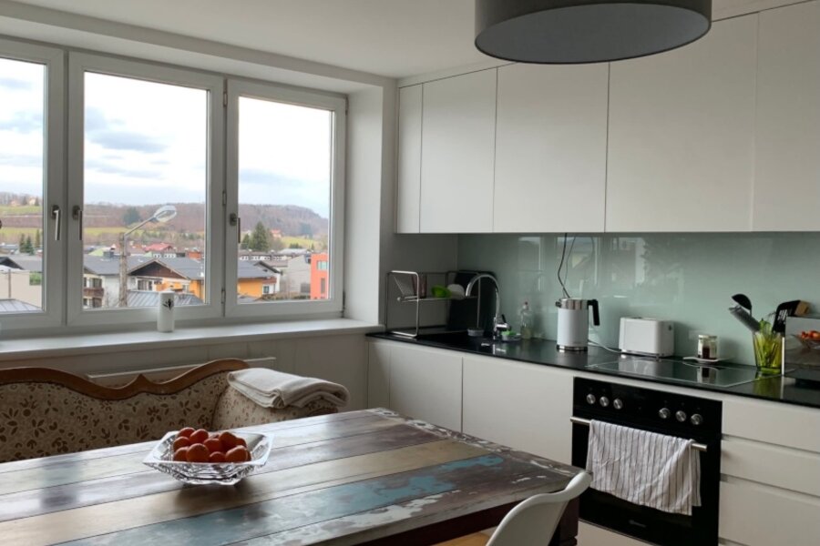 Spacious open-plan kitchen and living area as a shared common space