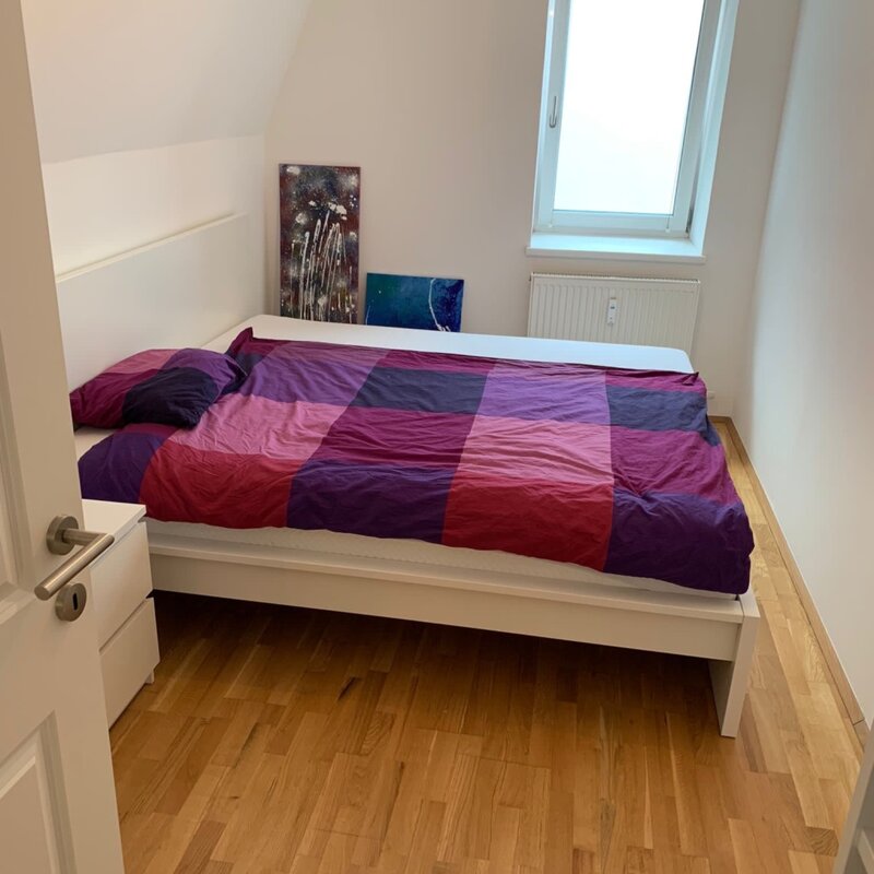 This photo shows the available furnished room, featuring a comfortable double bed