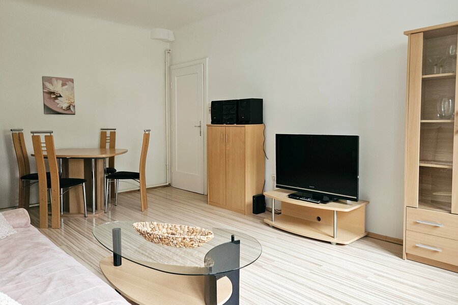 dining table and tv wall in living room