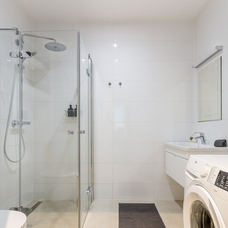 Badezimmer mit Waschmaschiene