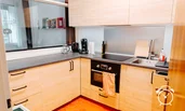 Kitchen with window-wide hatch