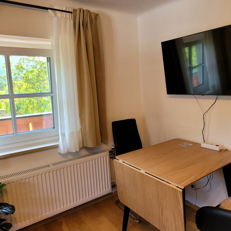 Dining table and Smart TV | © Marianne Witzko
