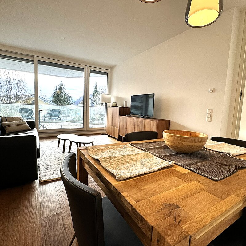 Cosy, bright living room with kitchen and balcony | © PSG