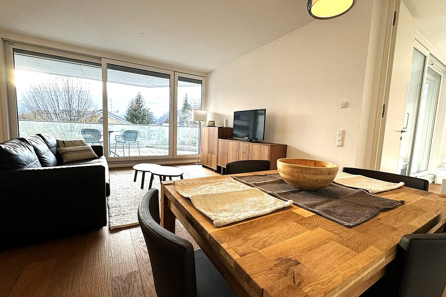 Cosy, bright living room with kitchen and balcony | © PSG