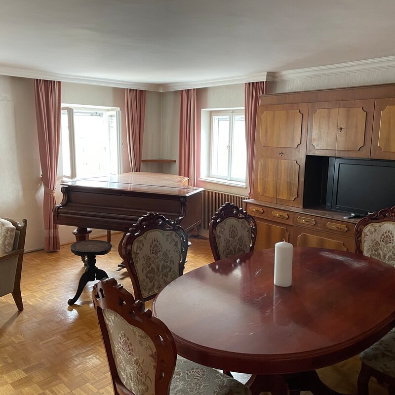 Dining table with grand piano