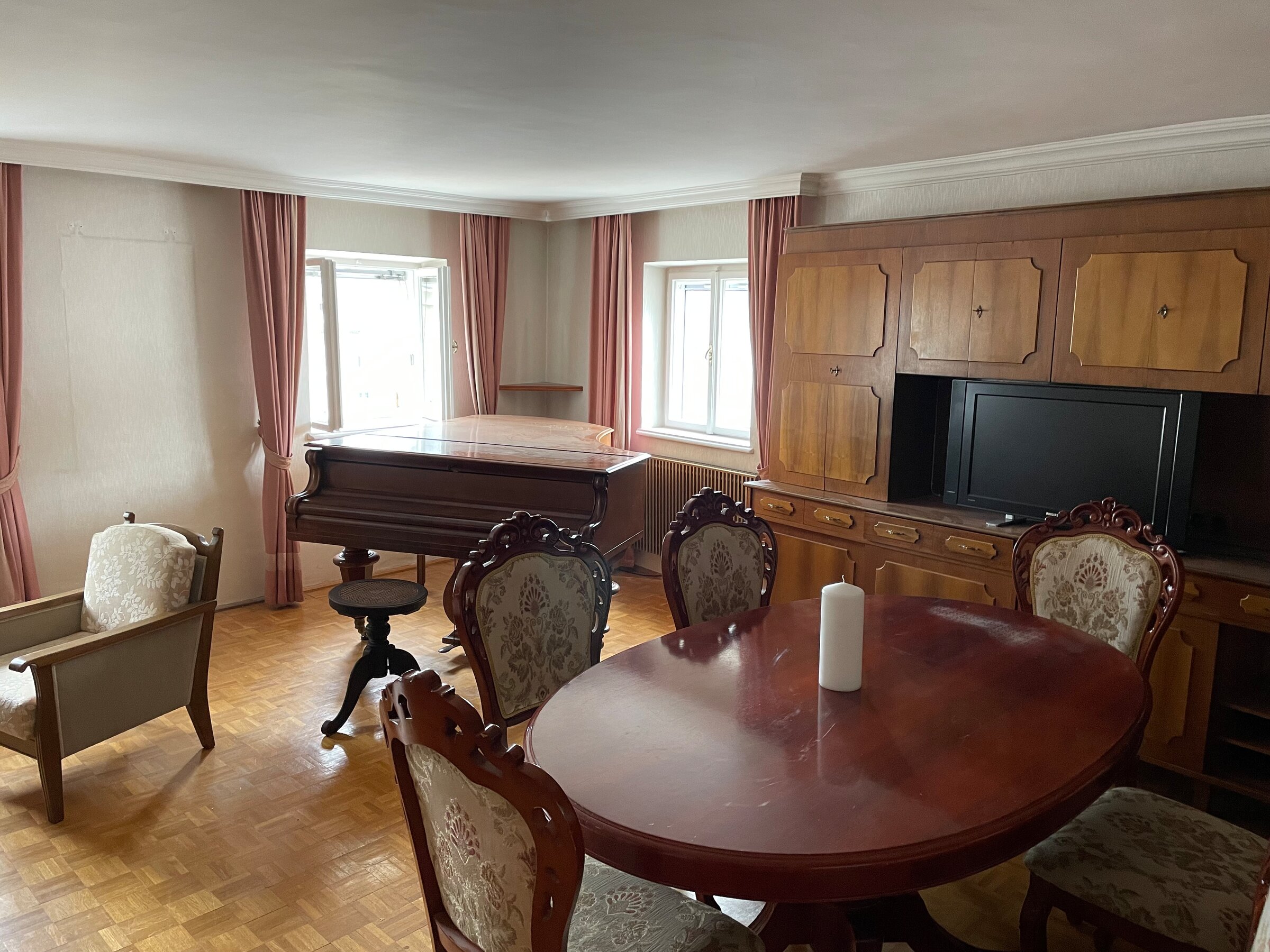 Dining table with grand piano