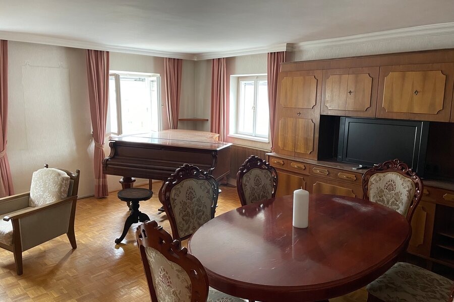 Dining table with grand piano