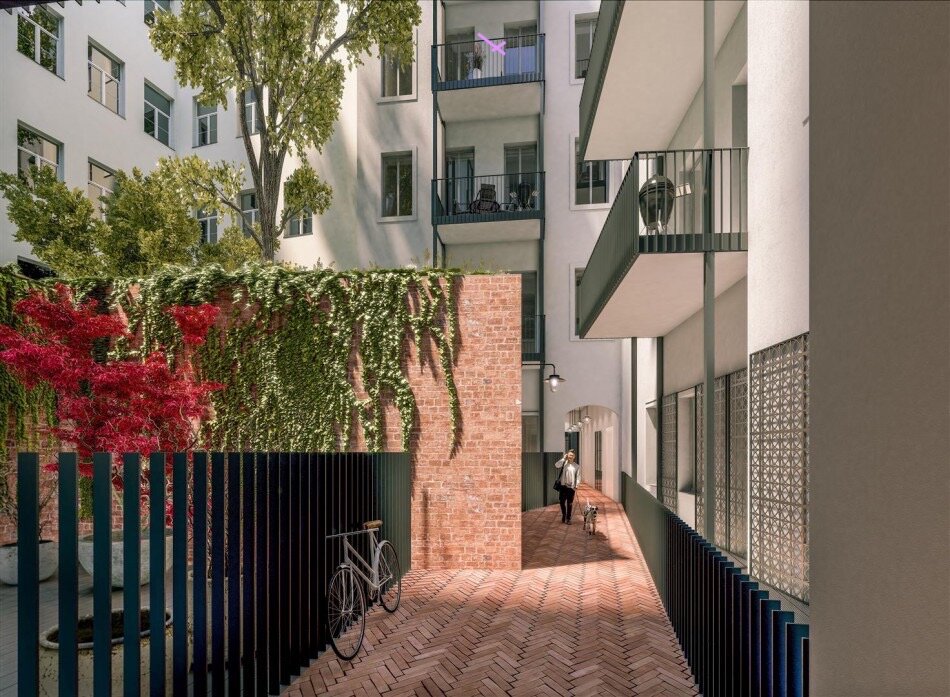 Innenhof mit Baum, Fahrrad-Aufbewahrungs-Raum und automatischer Beleuchtung | © Malek Herbst Architects