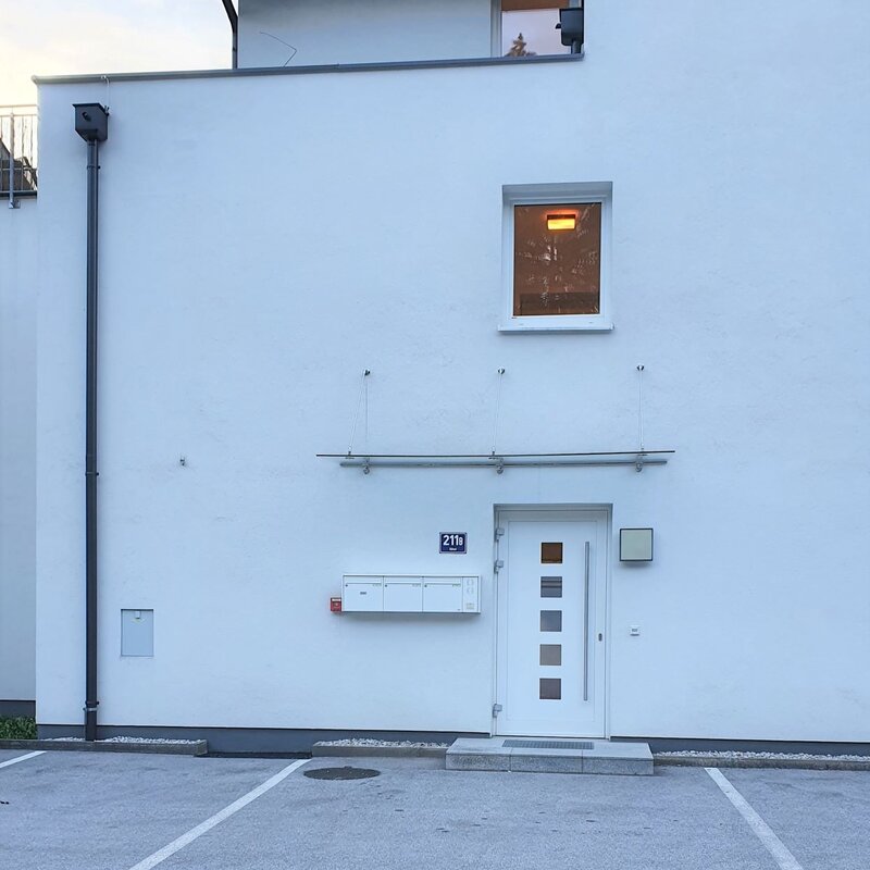 Parking spot to the left of front door